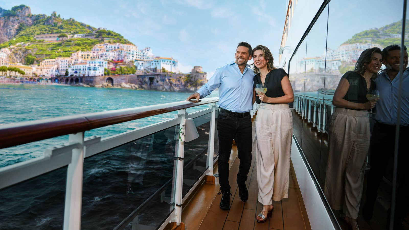 Couple on a cruise ship deck at sea